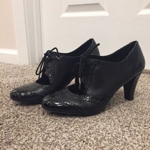 Antique style leather high heels.